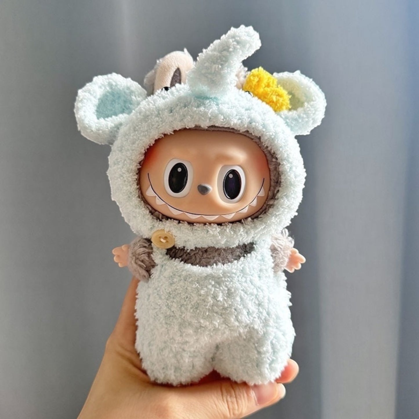 Dress up your Labubu doll in this adorable Cute Elephant costume! Perfect for Labubu versions 1, 2, and 3, this outfit will add a playful touch to your collection. With worldwide shipping and fast delivery, you'll have your Labubu ready for their next adventure in no time. (Labubu figure not included.), Cute Elephant costume style - Handmand Labubu Doll Outfit