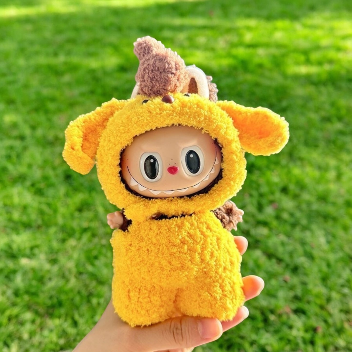 Transform your labubu into a lovable pup with this handmand costume! Perfect for versions 1, 2, and 3, this cute yellow outfit will surely bring a smile to faces worldwide. (Labubu figure not included). Woof!, Cute Yellow Puppy costume style - Handmand Labubu Doll Outfit