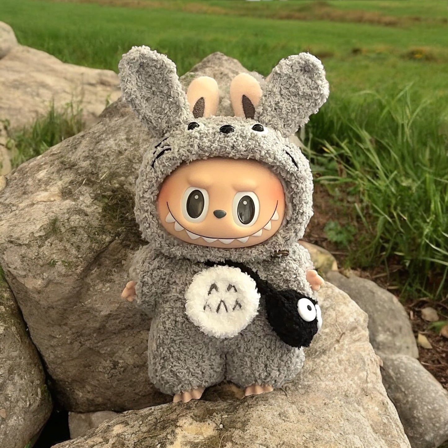 Transform your Labubu figure into the lovable Totoro with this handmade outfit! Perfect for versions 1, 2, and 3, this costume ships worldwide with fast shipping. Note: Labubu figure not included.
