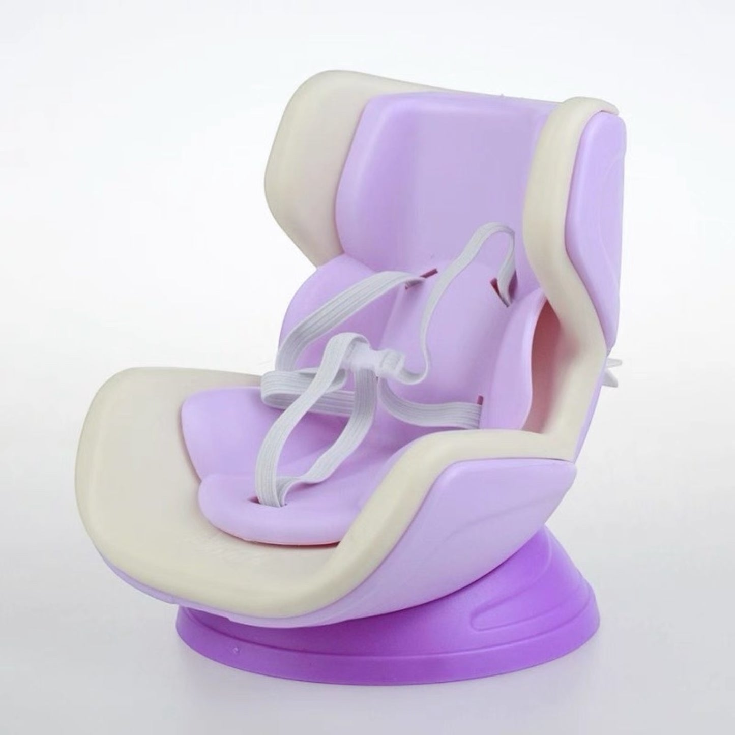 Purple and beige baby seat with a suction cup on a white background