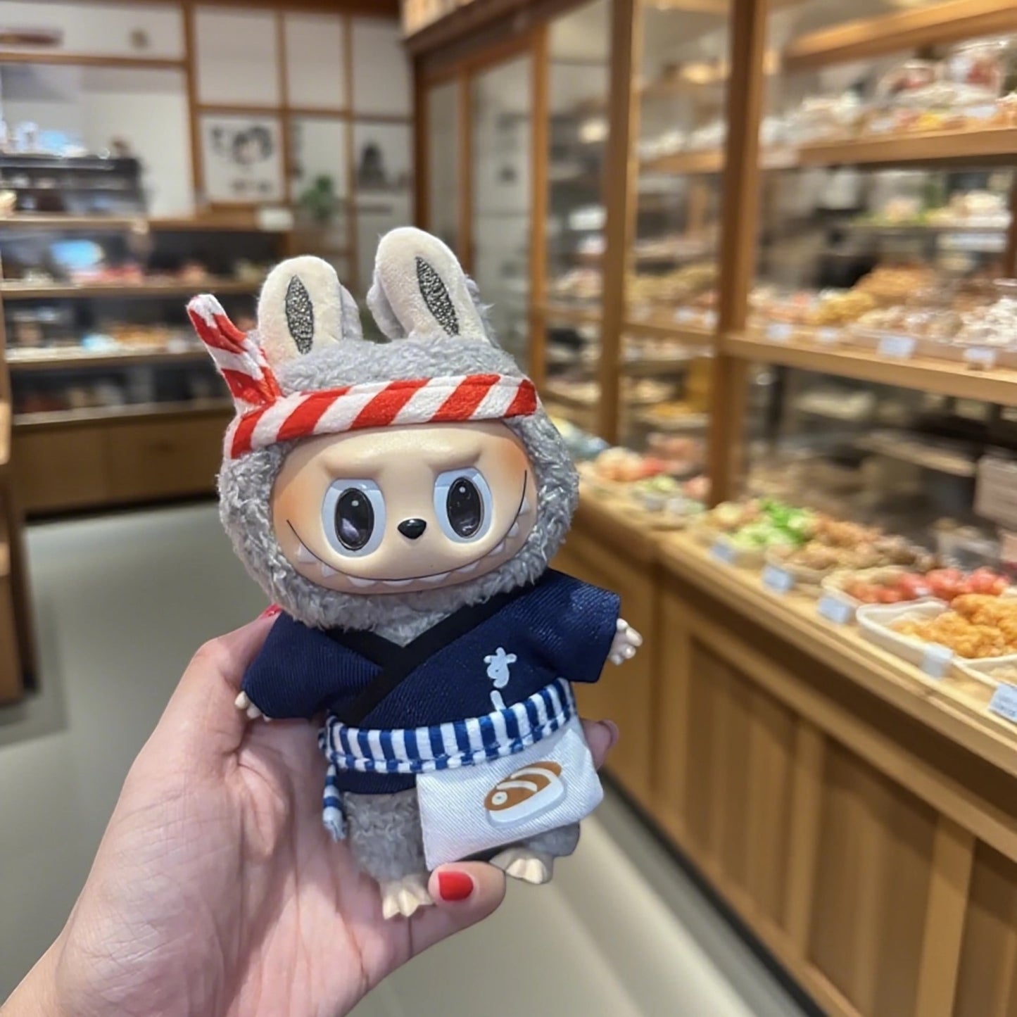 Labubu Doll wearing a Japanese Sushi Chef outfits in the Japan Sushi Shop