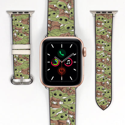 Smartwatch with a 'Baby Yoda' patterned band on a white background