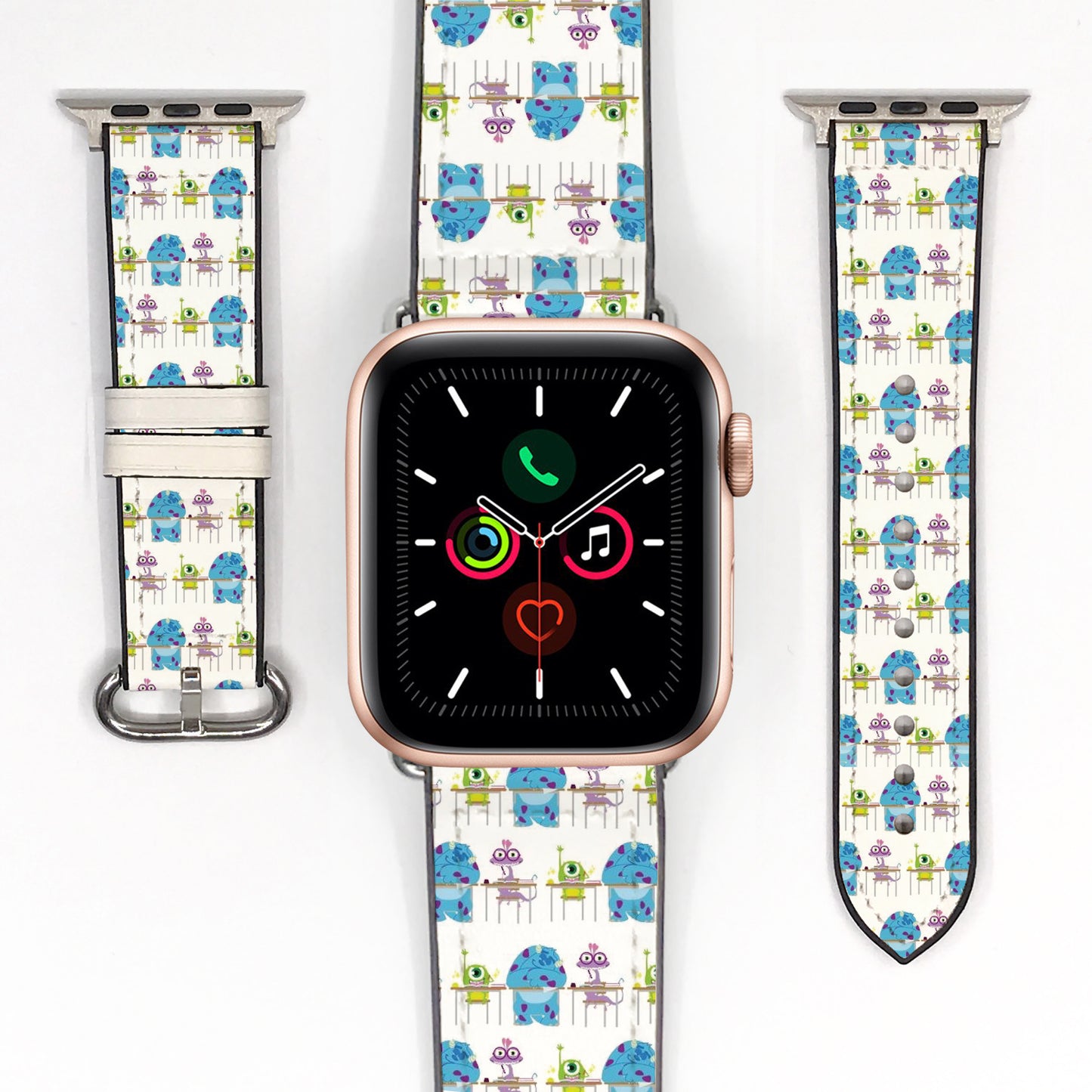 Smartwatch with a colorful monster inc characters patterned band on a white background