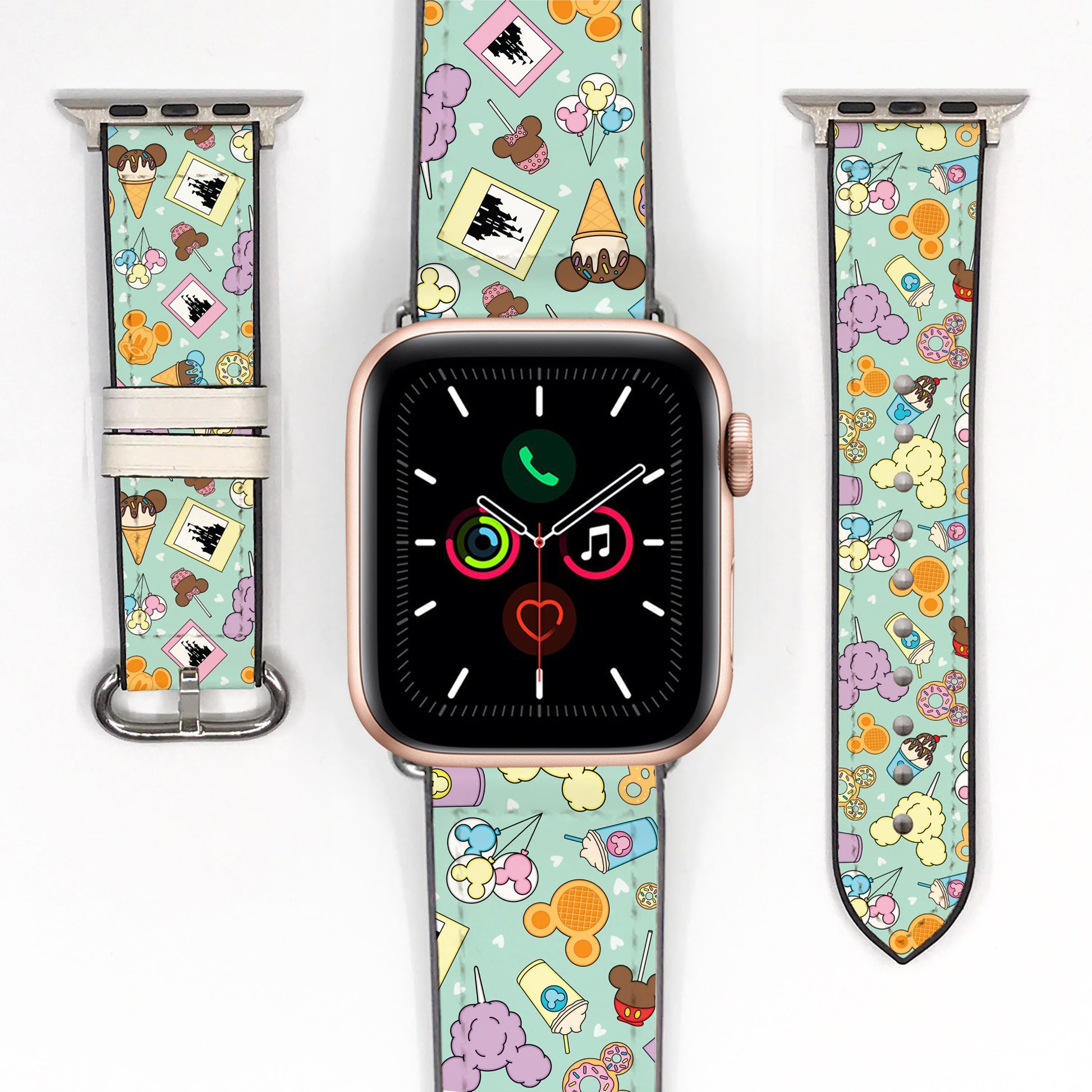 Smartwatch with a colorful disney theme park snack patterned band on a white background