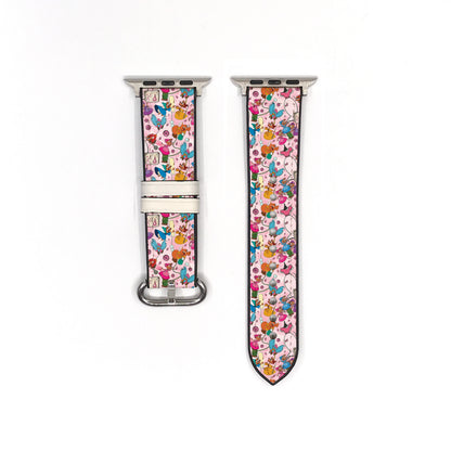 Smartwatch with a colorful cinderella mouse mates patterned band on a white background