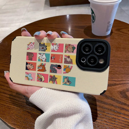 iPhone case with Disney Dogs and Cats character designs held by a person on a wooden table with a Starbucks cup.