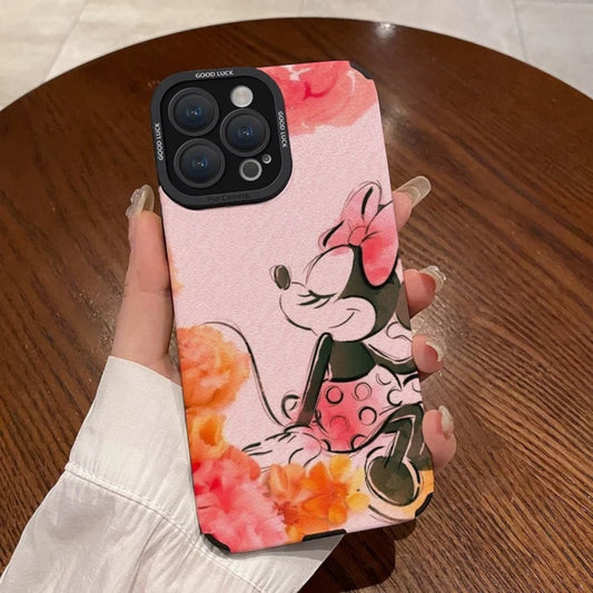 Pink iPhone case with cartoon character Disney Minnie Mouse design held by a hand