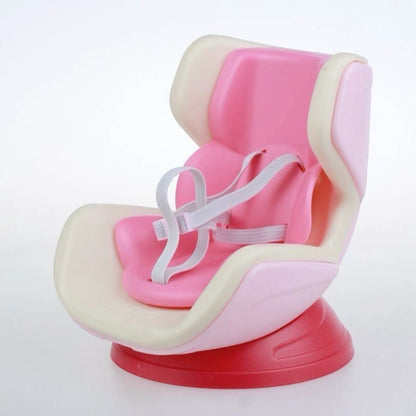 Pink and beige baby seat with a suction cup on a white background