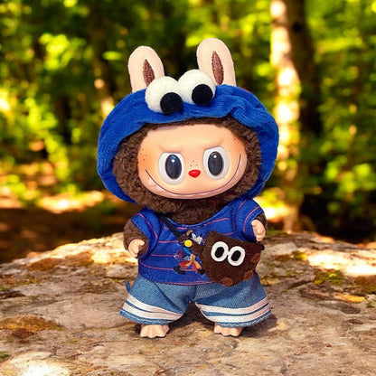 A Blue Cookie Monster Costume outfits on Labubu 17cm Doll with forrest background