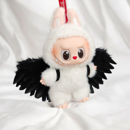 Elevate your Labubu doll's look with these handmade Angel Wings! Compatible with version 1, 2, and 3 of the Labubu outfit, you can now bring your doll's fantasies to life. Fast shipping available for worldwide orders. (Labubu figure not included).