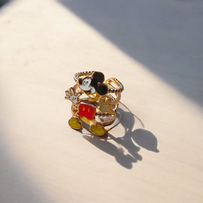Decorative ring with cartoon character Vintage Mickey Mouse design on a light surface