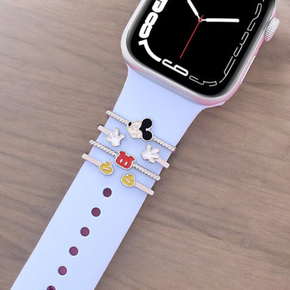 Smartwatch with decorative band featuring vintage mickey mouse designs on a light gray background